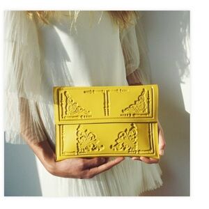 Yellow envelope clutch. Image courtesy MeDusa Bags.